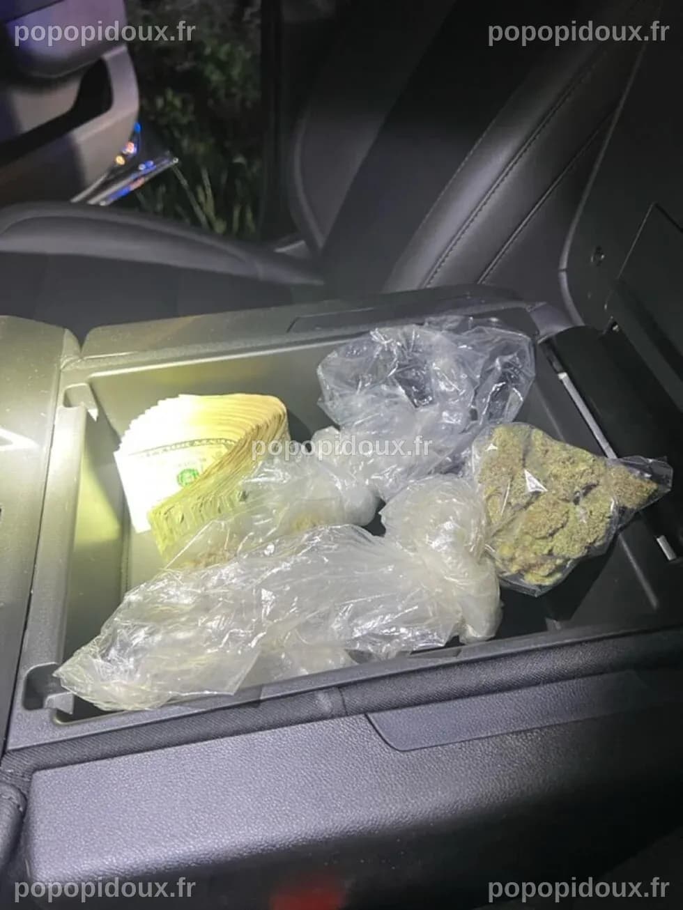 Large amount of cash and weed found during traffic stop, police say