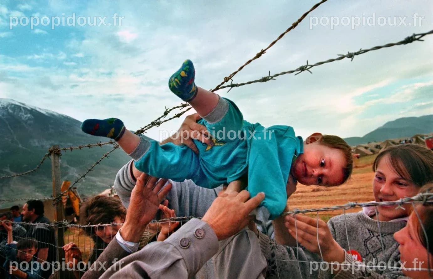 Carol Guzy, la photojournaliste américaine primée pour son image poignante d'une famille séparée par les autorités de l'immigration