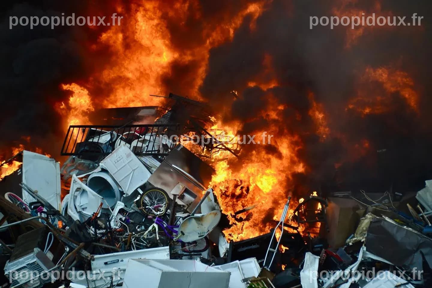 Large fire burns through pile of debris at Westport scrapyard | WPRI.com